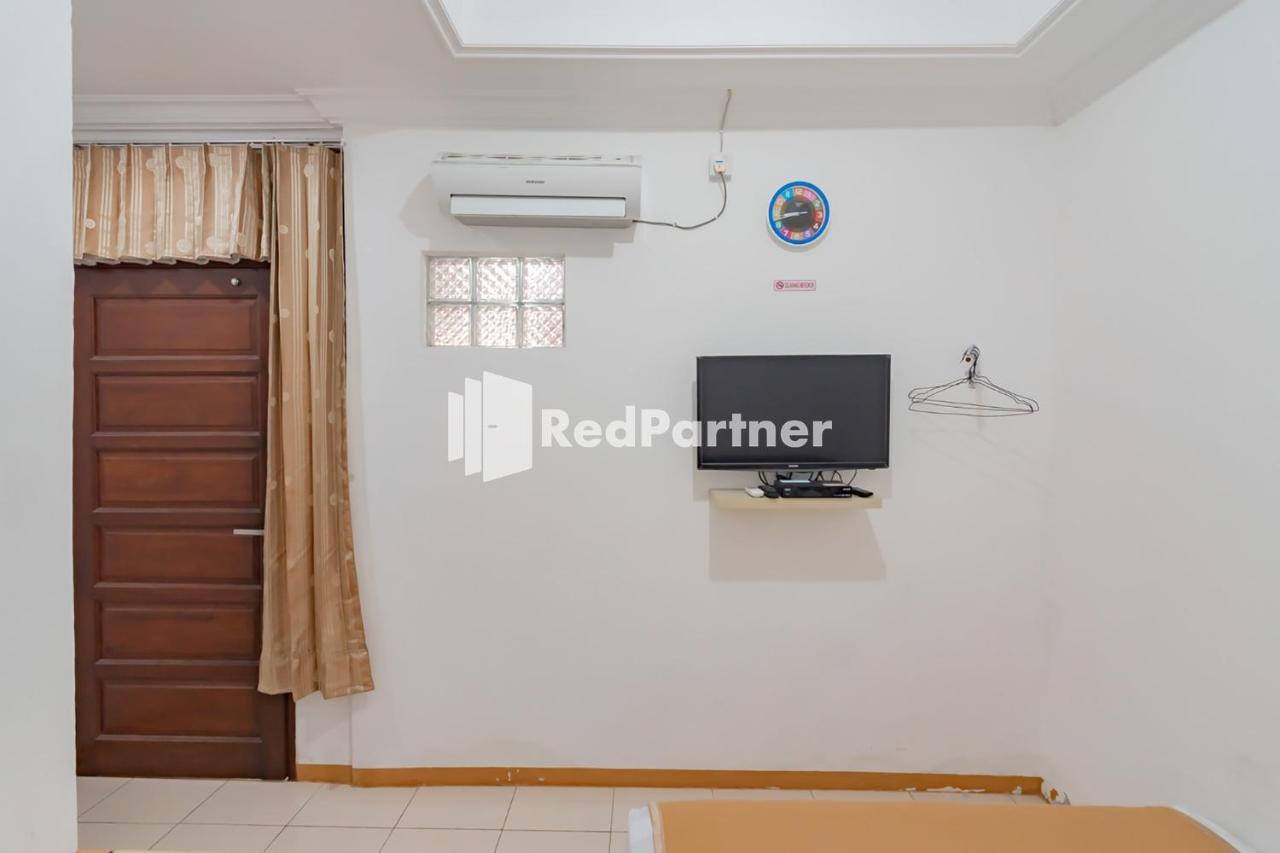 Langkar Guest House Syariah Mitra Reddoorz Samarinda Exterior photo