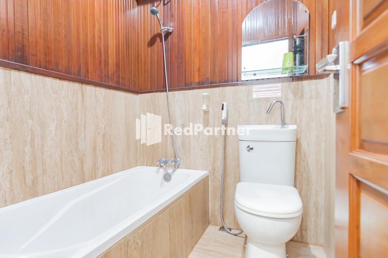 Langkar Guest House Syariah Mitra Reddoorz Samarinda Exterior photo
