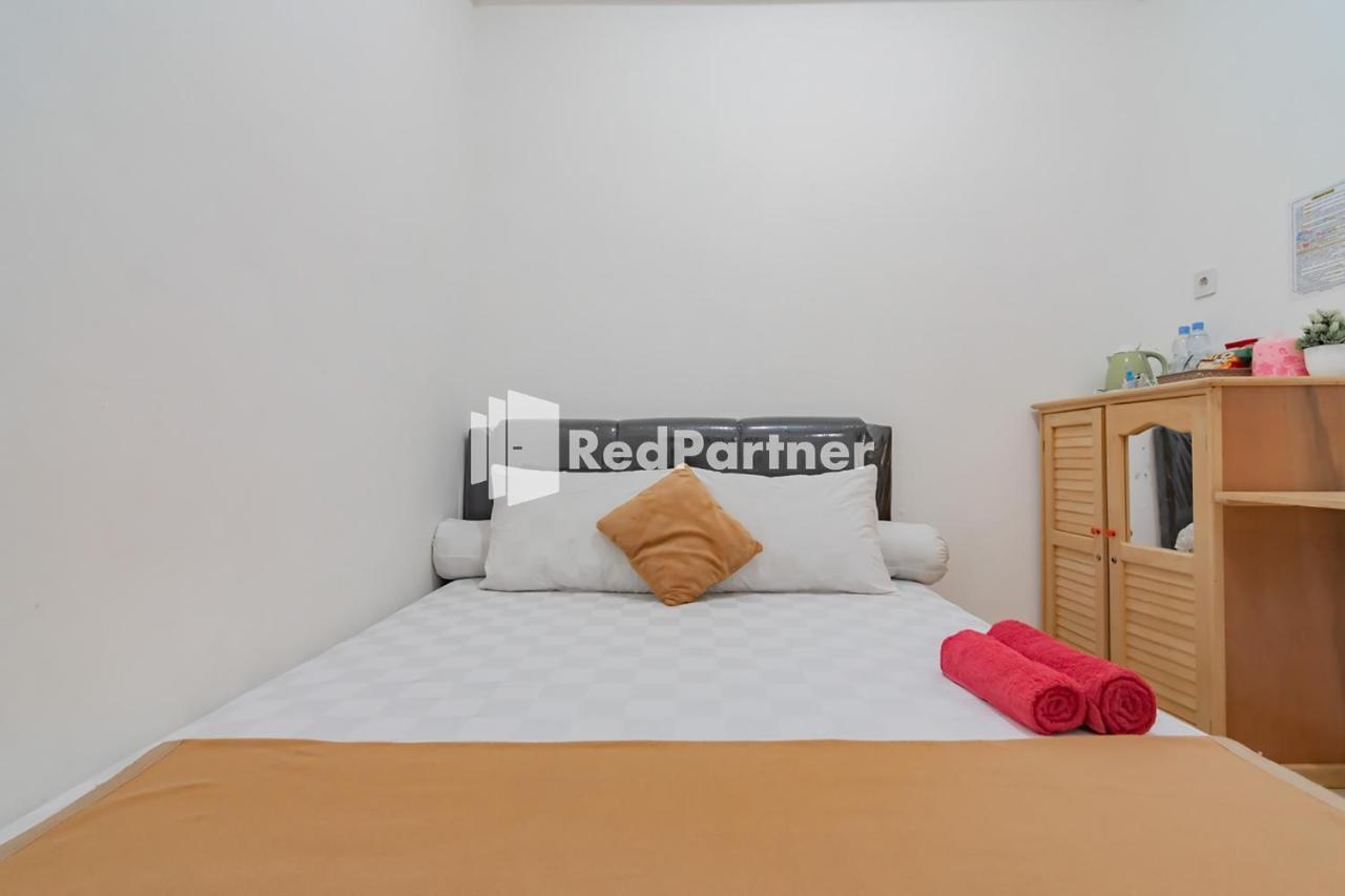 Langkar Guest House Syariah Mitra Reddoorz Samarinda Exterior photo
