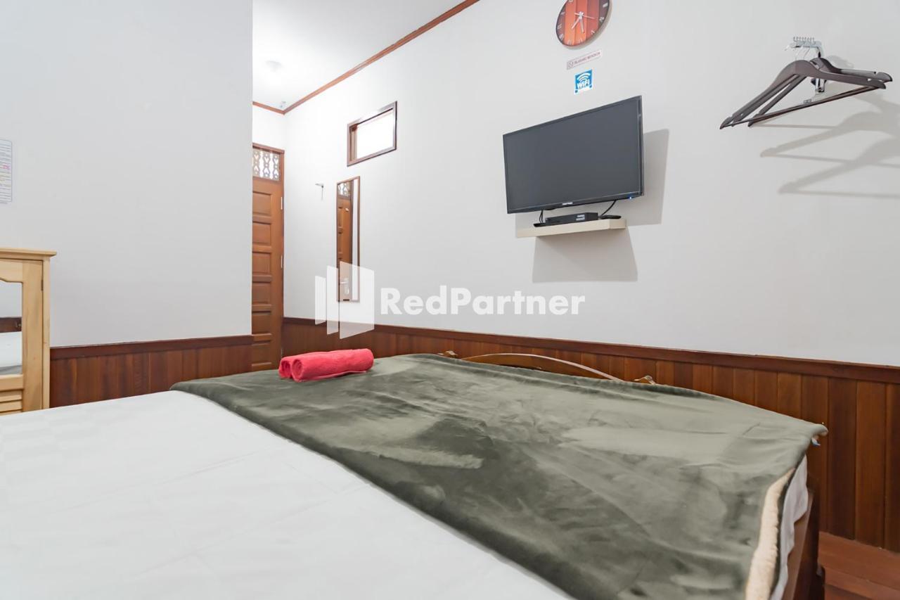Langkar Guest House Syariah Mitra Reddoorz Samarinda Exterior photo